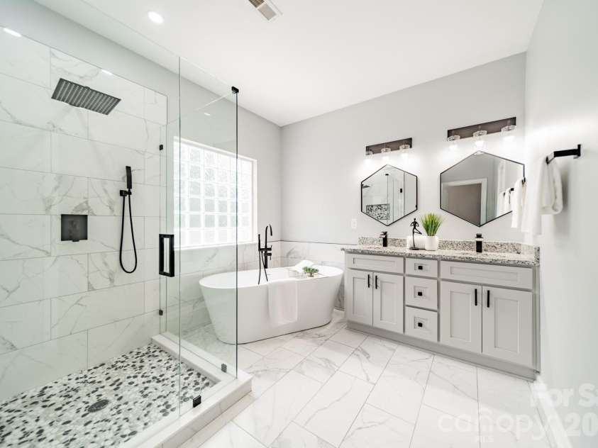 1109 Cooper Lane, Indian Trail, NC 28079.  MLS# CAR4384307, YatesRealty ID 27420. Upstairs Primary Bathroom
