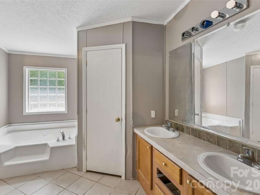 235 Misty Lane, Kannapolis, NC 28081.  MLS# CAR4387410, YatesRealty ID 27422. Master Bathroom1