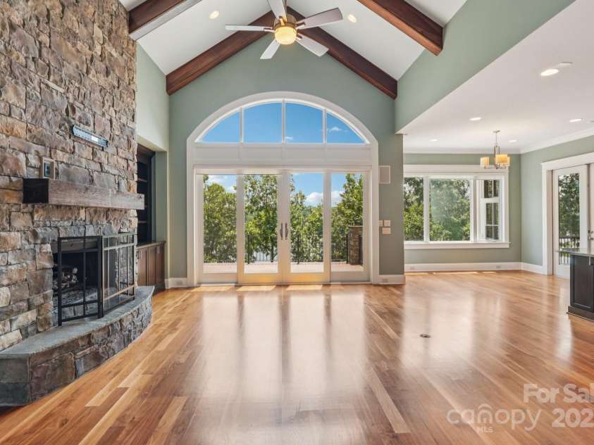 3229 Lake Pointe Drive, Belmont, NC 28012.  MLS# CAR4277223, YatesRealty ID 27427. Vaulted ceiling great room with lake view