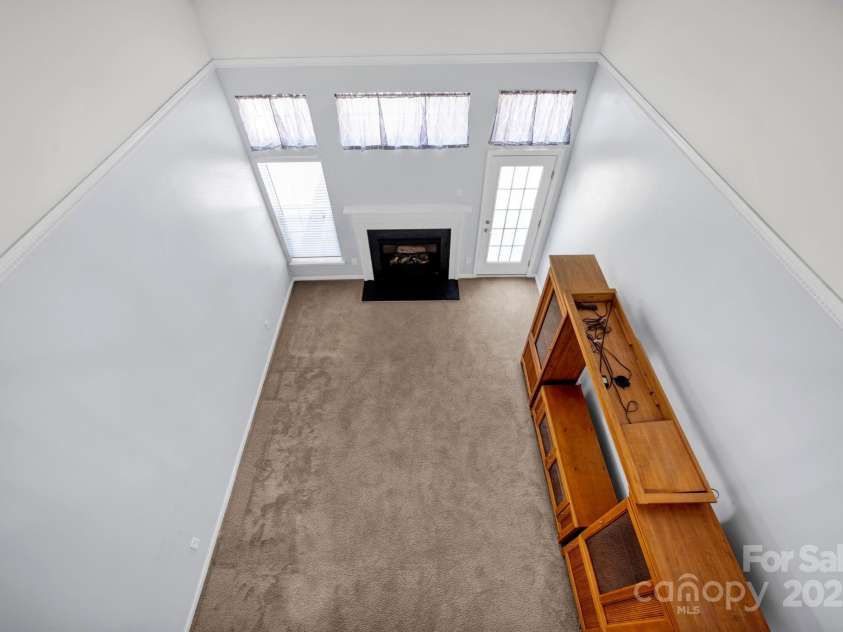 158 Snead Road, Fort Mill, SC 29715.  MLS# CAR4267677, YatesRealty ID 27429. View of Living Room from Loft