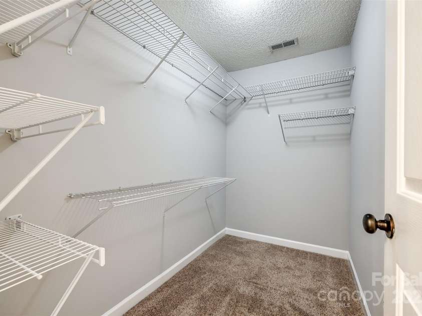 1706 Baylor Drive, Rock Hill, SC 29732.  MLS# CAR4275306, YatesRealty ID 27430. Large Walk In Closet in Primary Bedroom