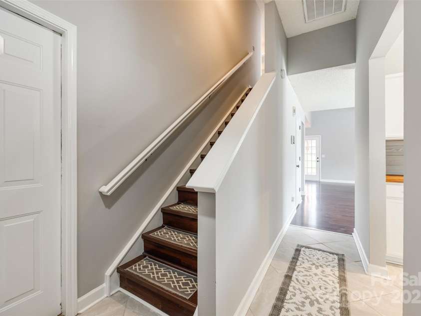1706 Baylor Drive, Rock Hill, SC 29732.  MLS# CAR4275306, YatesRealty ID 27430. Wood Stairs