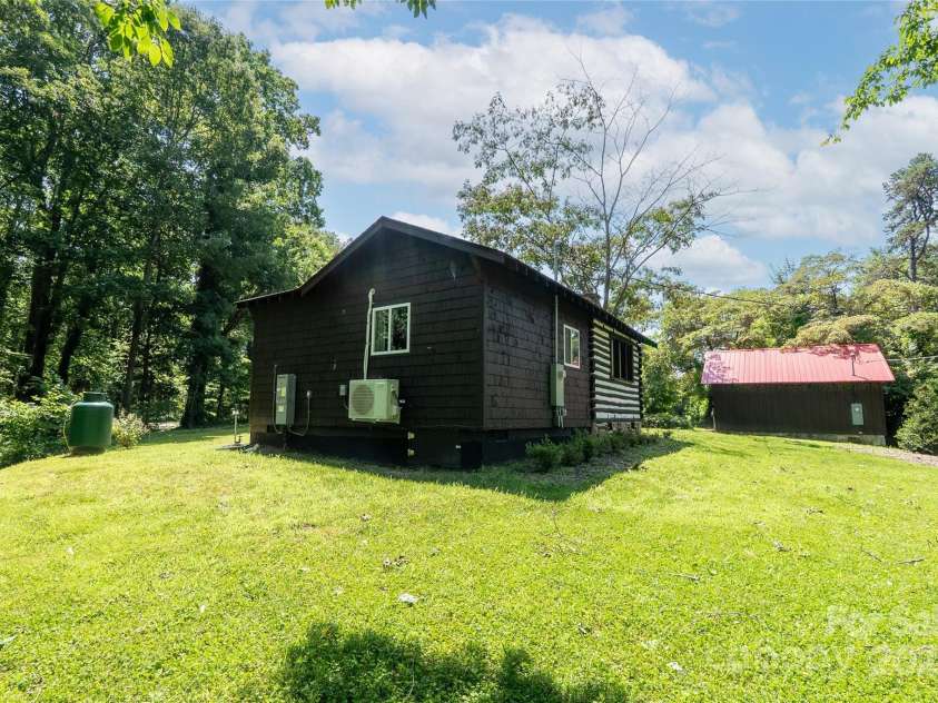 225 Wilderness Road, Tryon, NC 28782.  MLS# CAR4272632, YatesRealty ID 27434. New addition to 1900's Cabin