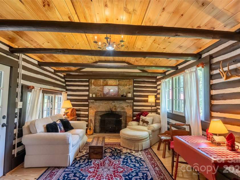 225 Wilderness Road, Tryon, NC 28782.  MLS# CAR4272632, YatesRealty ID 27434. Old section of the 1900's cabin!