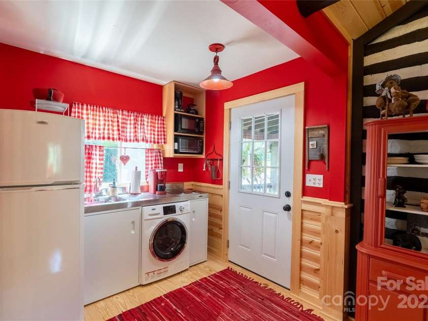 225 Wilderness Road, Tryon, NC 28782.  MLS# CAR4272632, YatesRealty ID 27434. Short-term rental ready!