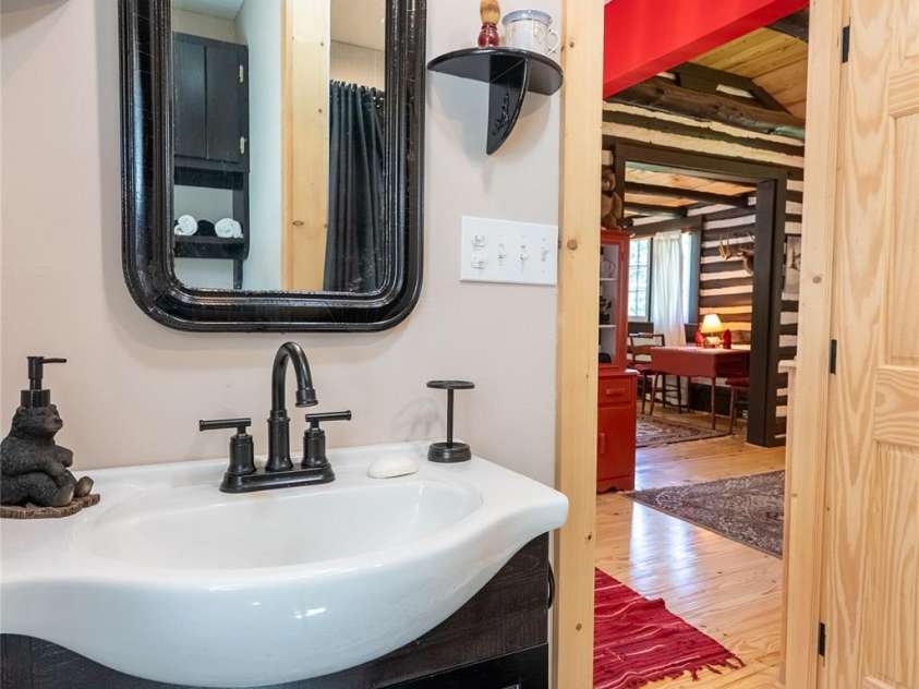 225 Wilderness Road, Tryon, NC 28782.  MLS# CAR4272632, YatesRealty ID 27434. Spacious bathroom