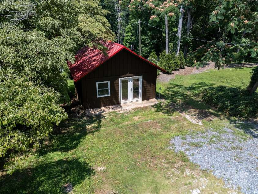 225 Wilderness Road, Tryon, NC 28782.  MLS# CAR4272632, YatesRealty ID 27434. Workshop.