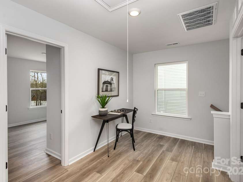 903 Cathey Road, Charlotte, NC 28214.  MLS# CAR4220736, YatesRealty ID 2744. Loft area for work/study. Representative Photo