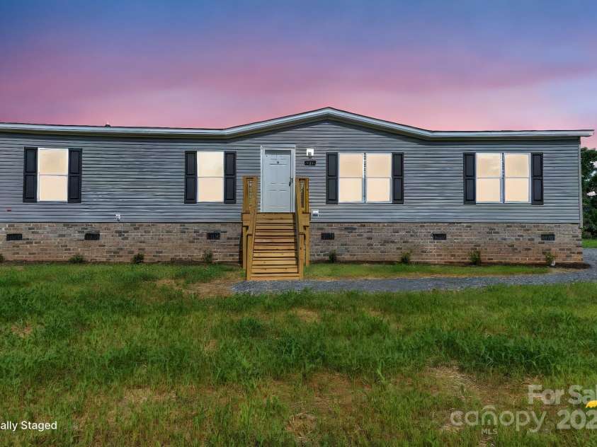 493 Eagle Mills Road, Hamptonville, NC 27020.  MLS# CAR4259452, YatesRealty ID 27442. 