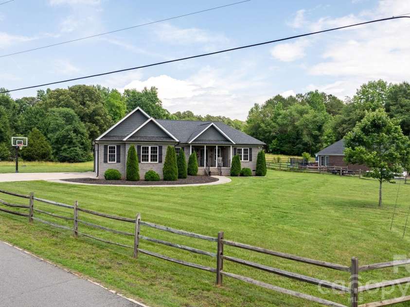 1100 Rainbow Drive, Mount Holly, NC 28120.  MLS# CAR4388731, YatesRealty ID 27444. 