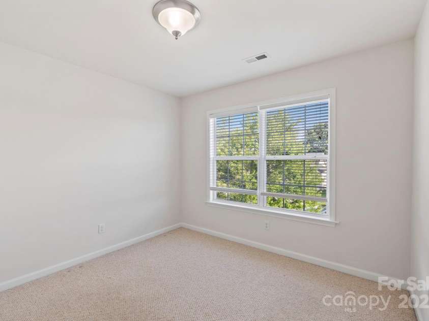 138 Black River Road, Fletcher, NC 28732.  MLS# CAR4282304, YatesRealty ID 27446. Upper level bedroom