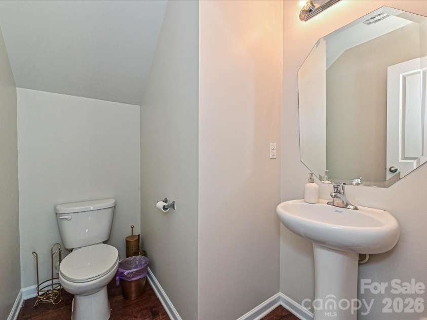 6709 Broad Valley Court, Charlotte, NC 28216.  MLS# CAR4388395, YatesRealty ID 27447. Half bathroom