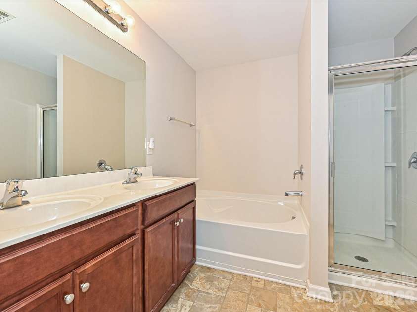 6709 Broad Valley Court, Charlotte, NC 28216.  MLS# CAR4388395, YatesRealty ID 27447. Primary bathroom
