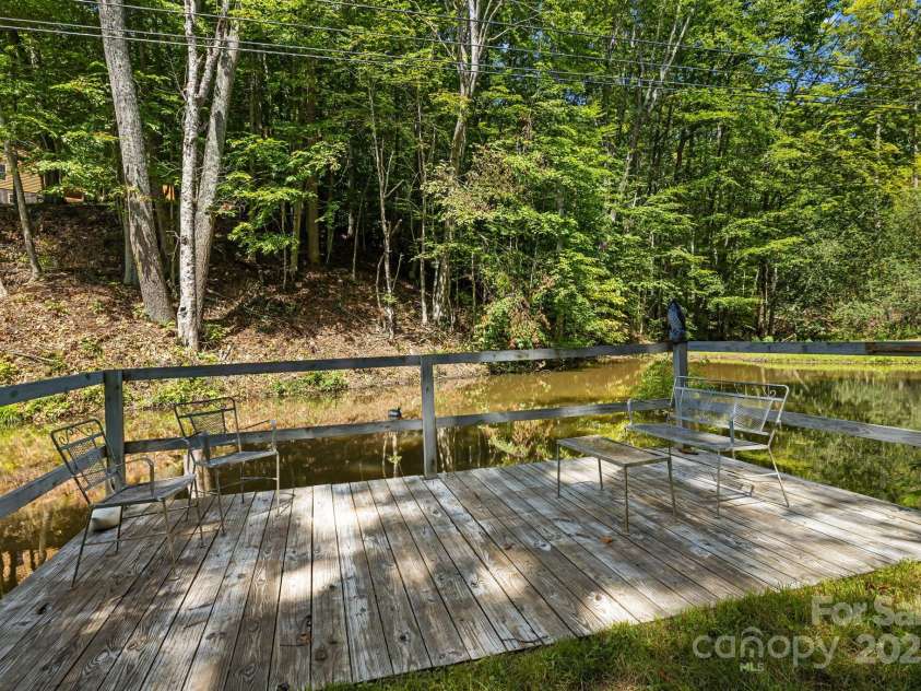 66 Volunteer Drive, Burnsville, NC 28714.  MLS# CAR4278537, YatesRealty ID 27449. Beautiful dock!