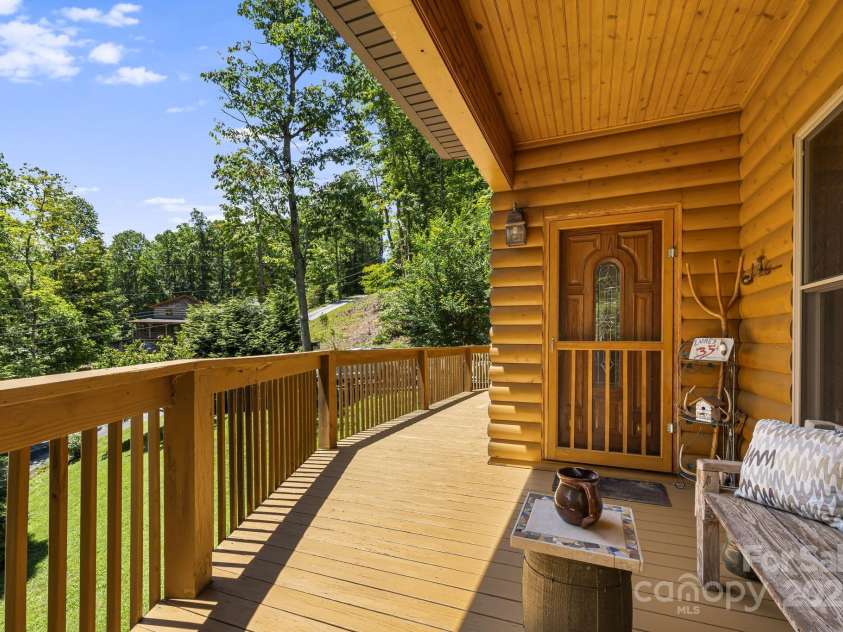 66 Volunteer Drive, Burnsville, NC 28714.  MLS# CAR4278537, YatesRealty ID 27449. Front Porch