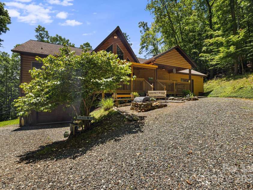 66 Volunteer Drive, Burnsville, NC 28714.  MLS# CAR4278537, YatesRealty ID 27449. Rear of home