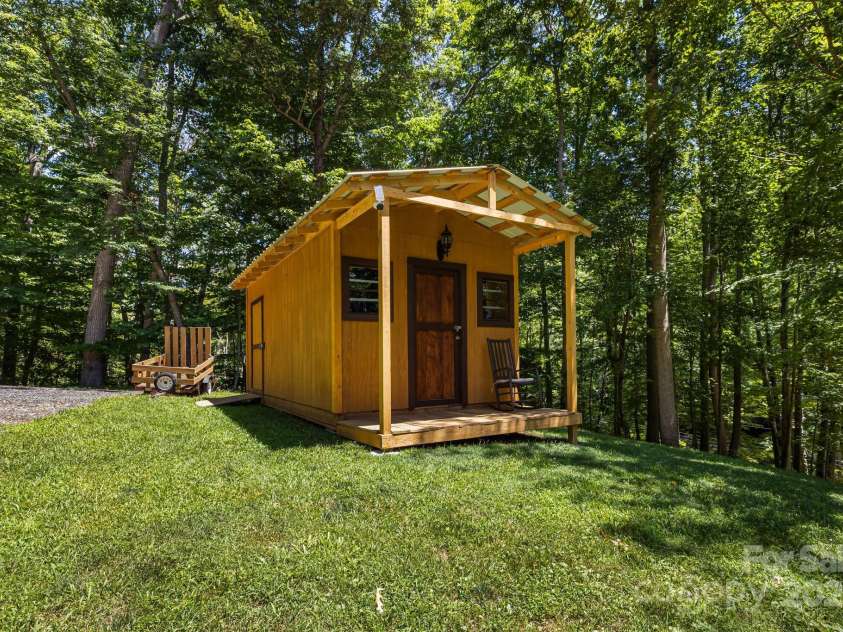 66 Volunteer Drive, Burnsville, NC 28714.  MLS# CAR4278537, YatesRealty ID 27449. Shed with power