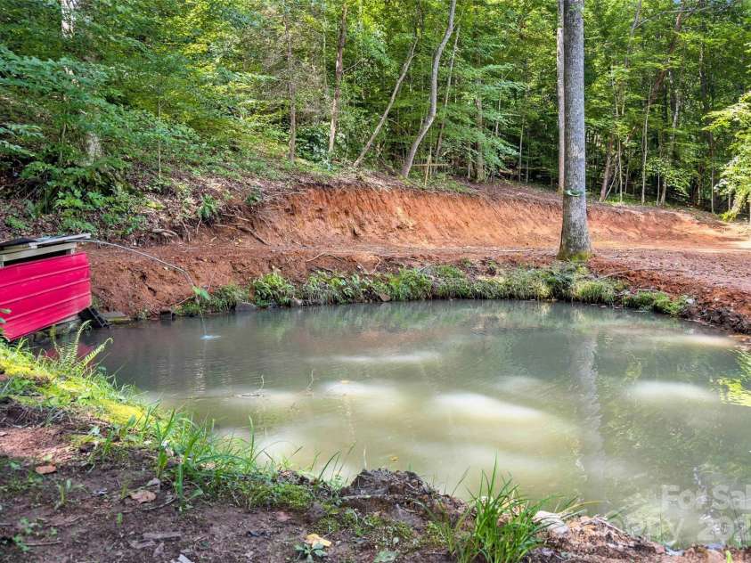 100 Goose Creek Road, Marion, NC 28752.  MLS# CAR4166247, YatesRealty ID 2745. Fishing Pond