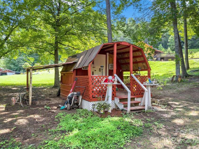 100 Goose Creek Road, Marion, NC 28752.  MLS# CAR4166247, YatesRealty ID 2745. Small Cabin beside the fishing pond