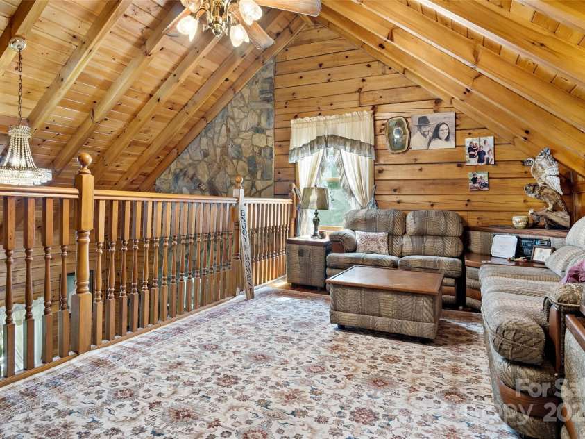 100 Goose Creek Road, Marion, NC 28752.  MLS# CAR4166247, YatesRealty ID 2745. Upstairs living room