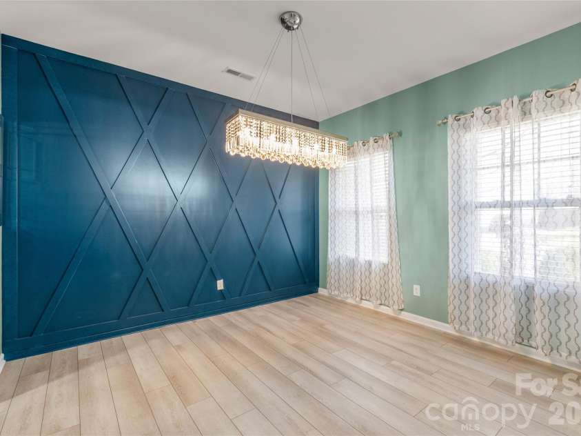 10229 Snowbell Court, Charlotte, NC 28215.  MLS# CAR4338183, YatesRealty ID 2745. Dining room w/ accent wall