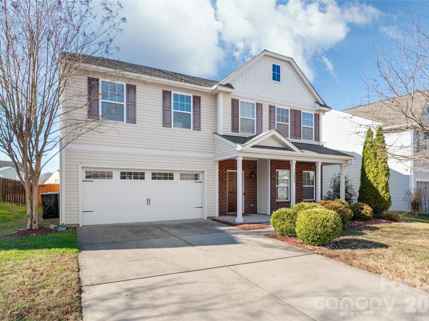 10229 Snowbell Court, Charlotte, NC 28215.  MLS# CAR4338183, YatesRealty ID 2745. Front of house and garage