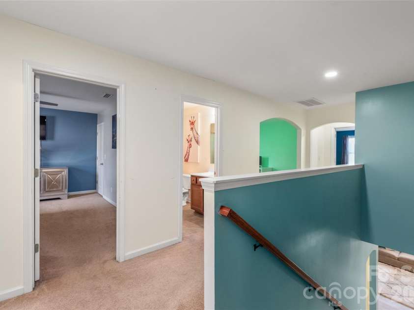 10229 Snowbell Court, Charlotte, NC 28215.  MLS# CAR4338183, YatesRealty ID 2745. Upper floor hall