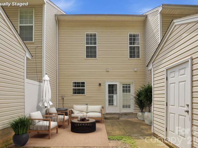 5315 Jocelyn Lane, Charlotte, NC 28269.  MLS# CAR4387226, YatesRealty ID 27454. Back Patio / Virtually Staged
