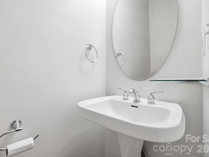 5315 Jocelyn Lane, Charlotte, NC 28269.  MLS# CAR4387226, YatesRealty ID 27454. Bathroom on the first floor