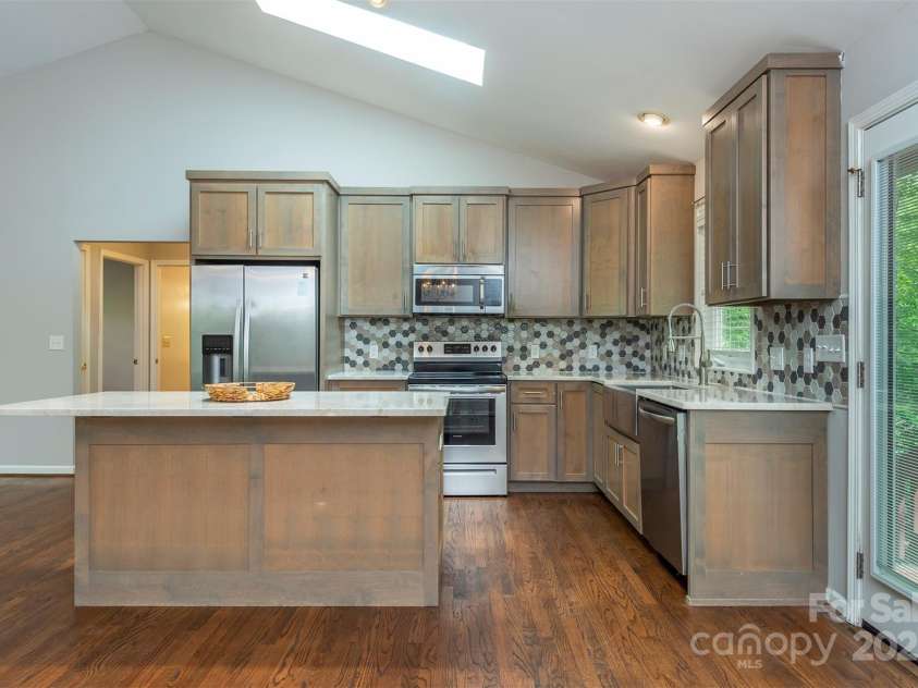 114 Richard Lane, Black Mountain, NC 28711.  MLS# CAR4270307, YatesRealty ID 27456. Fully updated kitchen.