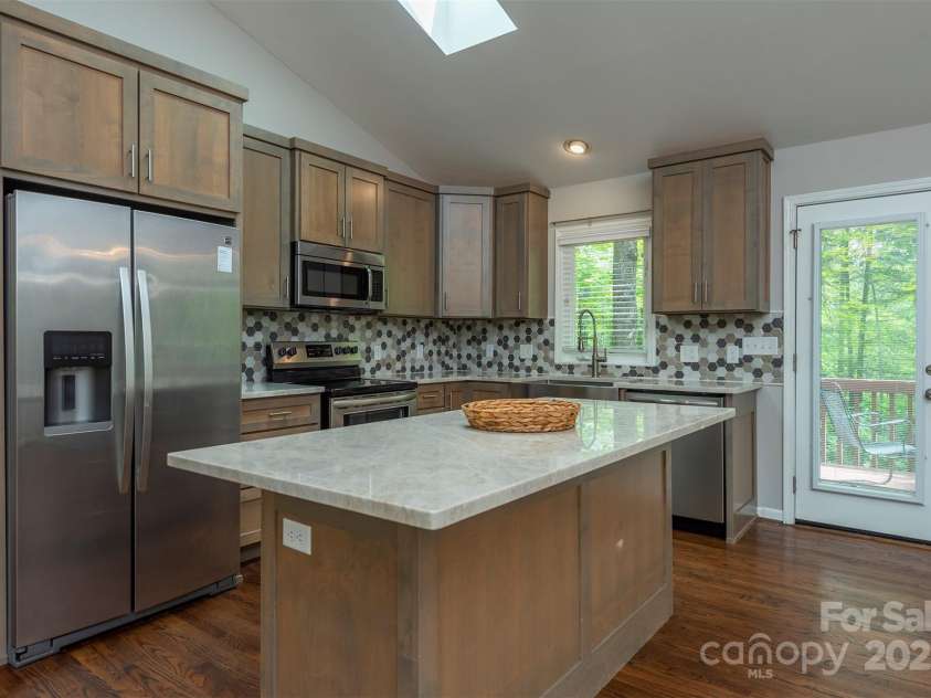 114 Richard Lane, Black Mountain, NC 28711.  MLS# CAR4270307, YatesRealty ID 27456. Fully updated kitchen.
