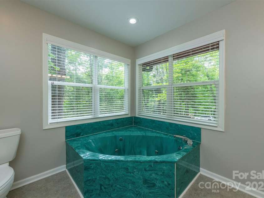 114 Richard Lane, Black Mountain, NC 28711.  MLS# CAR4270307, YatesRealty ID 27456. Spacious primary bathroom with great light.