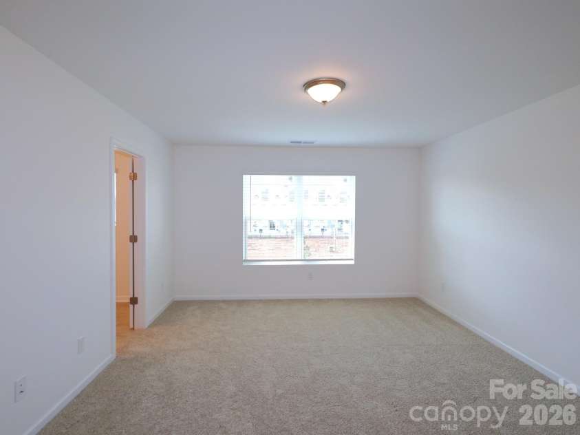 830 Earhart Street, Concord, NC 28027.  MLS# CAR4388782, YatesRealty ID 27458. Owner's suite