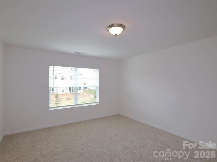 830 Earhart Street, Concord, NC 28027.  MLS# CAR4388782, YatesRealty ID 27458. Owner's suite