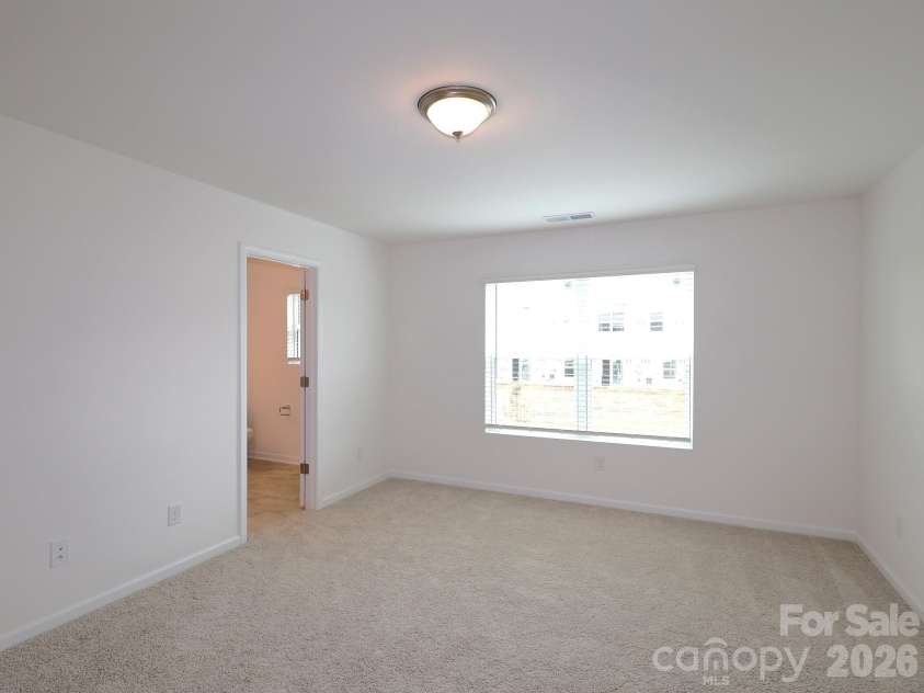 830 Earhart Street, Concord, NC 28027.  MLS# CAR4388782, YatesRealty ID 27458. Owner's suite