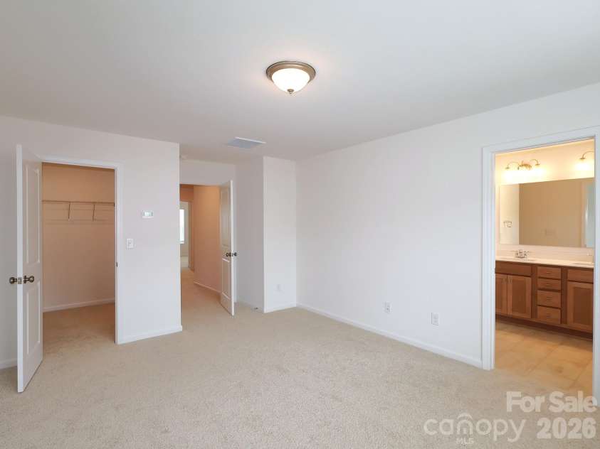 830 Earhart Street, Concord, NC 28027.  MLS# CAR4388782, YatesRealty ID 27458. Owner's suite