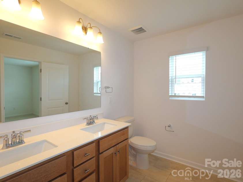 830 Earhart Street, Concord, NC 28027.  MLS# CAR4388782, YatesRealty ID 27458. Owner's suite