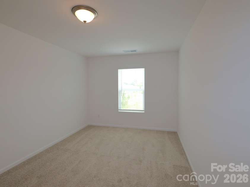 830 Earhart Street, Concord, NC 28027.  MLS# CAR4388782, YatesRealty ID 27458. Secondary bedroom
