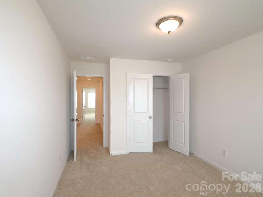 830 Earhart Street, Concord, NC 28027.  MLS# CAR4388782, YatesRealty ID 27458. Secondary bedroom