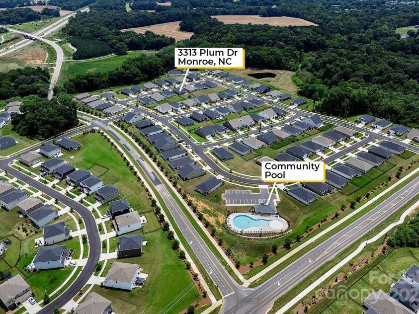 3313 Plum Drive, Monroe, NC 28110.  MLS# CAR4274387, YatesRealty ID 27465. Bird’s-eye view of home, lot, and surrounding area.