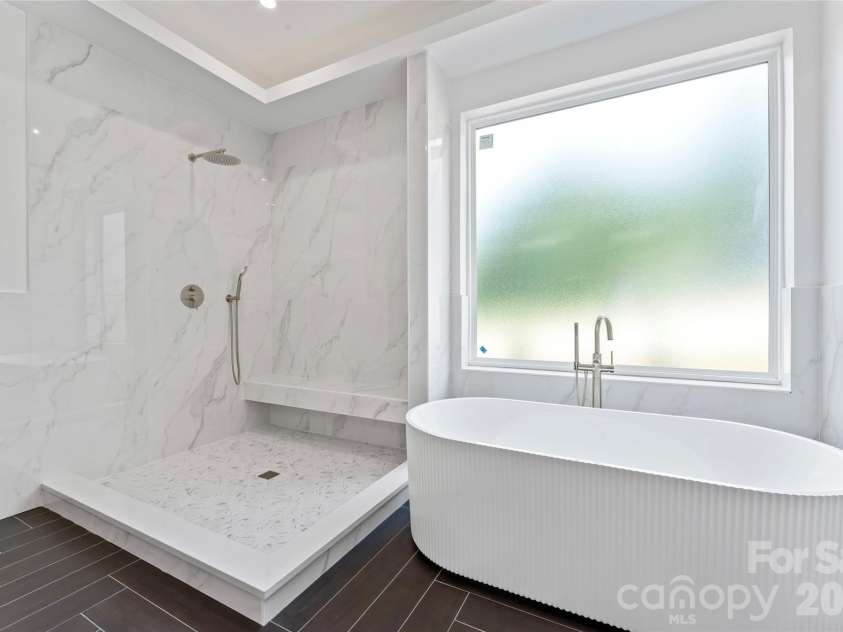 3078 Mountain Creek Drive, Sherrills Ford, NC 28673.  MLS# CAR4260558, YatesRealty ID 27468. Primary BA -- floor and wall tiled shower. soaking tub, glass doors to be installed