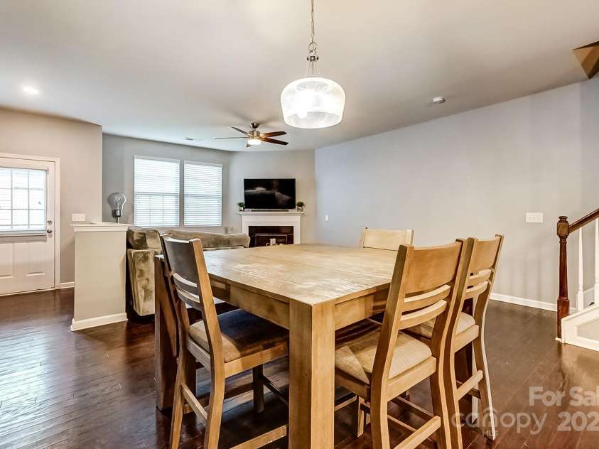 3033 Honeylocust Lane, Fort Mill, SC 29707.  MLS# CAR4214279, YatesRealty ID 2747. Dining Area overlooking Living Room