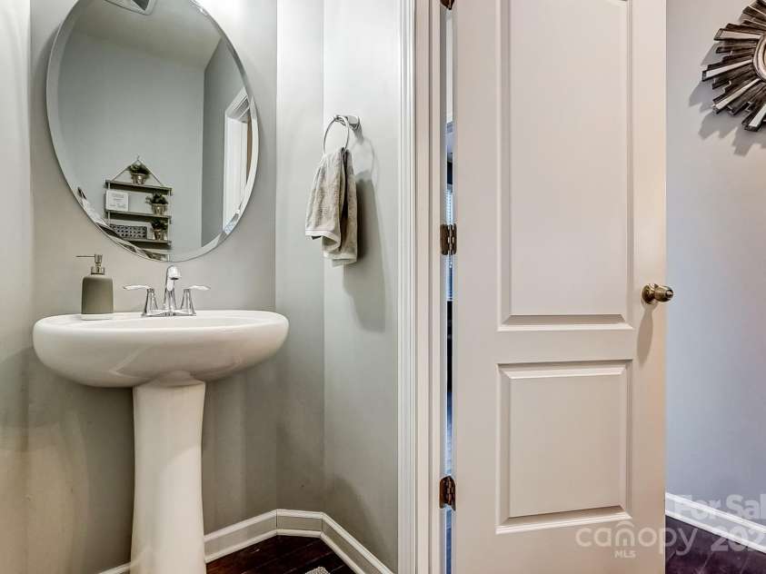 3033 Honeylocust Lane, Fort Mill, SC 29707.  MLS# CAR4214279, YatesRealty ID 2747. Half Bath on Main