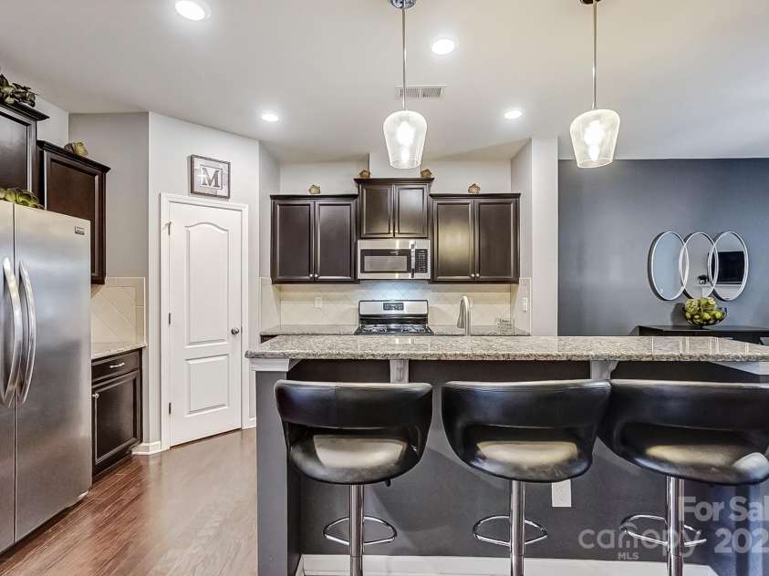 3033 Honeylocust Lane, Fort Mill, SC 29707.  MLS# CAR4214279, YatesRealty ID 2747. Kitchen with Center Island