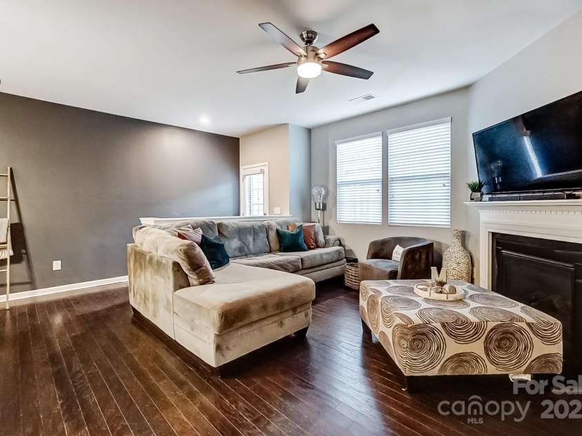 3033 Honeylocust Lane, Fort Mill, SC 29707.  MLS# CAR4214279, YatesRealty ID 2747. Living Room with Fireplace