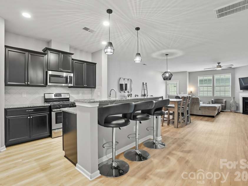 3033 Honeylocust Lane, Fort Mill, SC 29707.  MLS# CAR4305940, YatesRealty ID 2747. Beautiful New LVP Flooring on Main