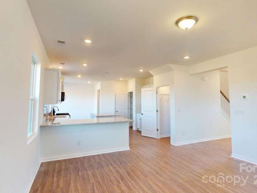 1821 Augustine Street, Monroe, NC 28112.  MLS# CAR4272882, YatesRealty ID 27471. Family room