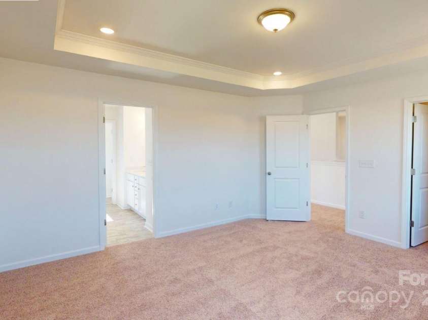 1821 Augustine Street, Monroe, NC 28112.  MLS# CAR4272882, YatesRealty ID 27471. Owners suite