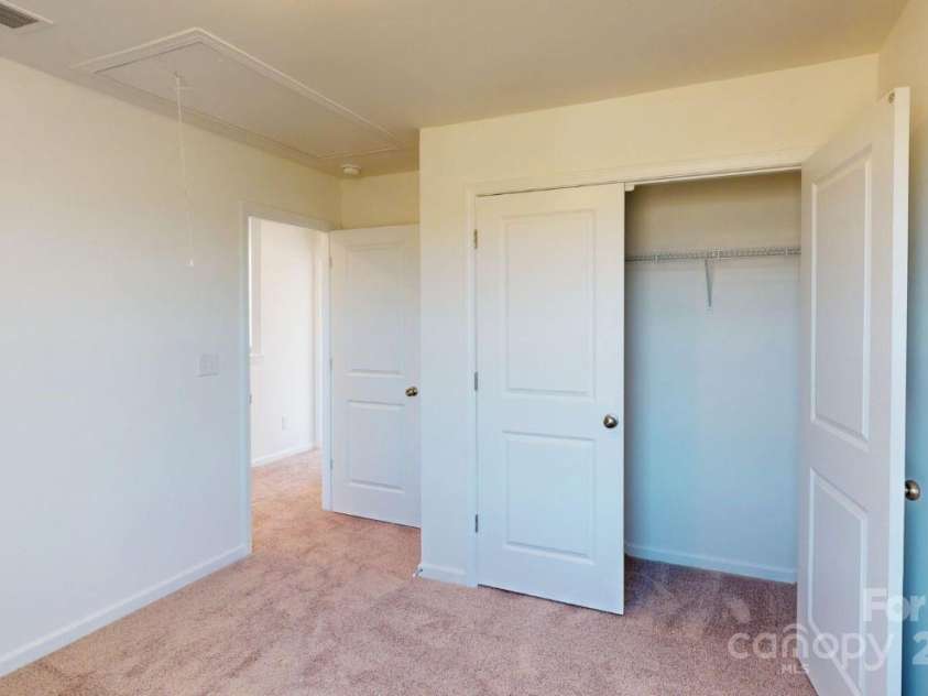 1821 Augustine Street, Monroe, NC 28112.  MLS# CAR4272882, YatesRealty ID 27471. Secondary bedroom