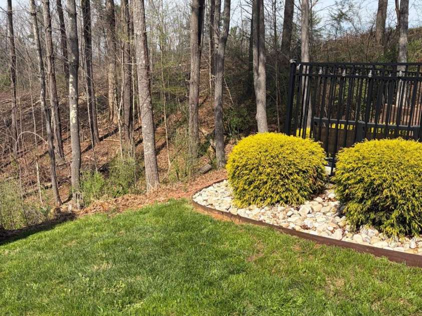 236 Robinwood Circle, Lenoir, NC 28645.  MLS# CAR4387573, YatesRealty ID 27472. Landscaping manicured meticulously